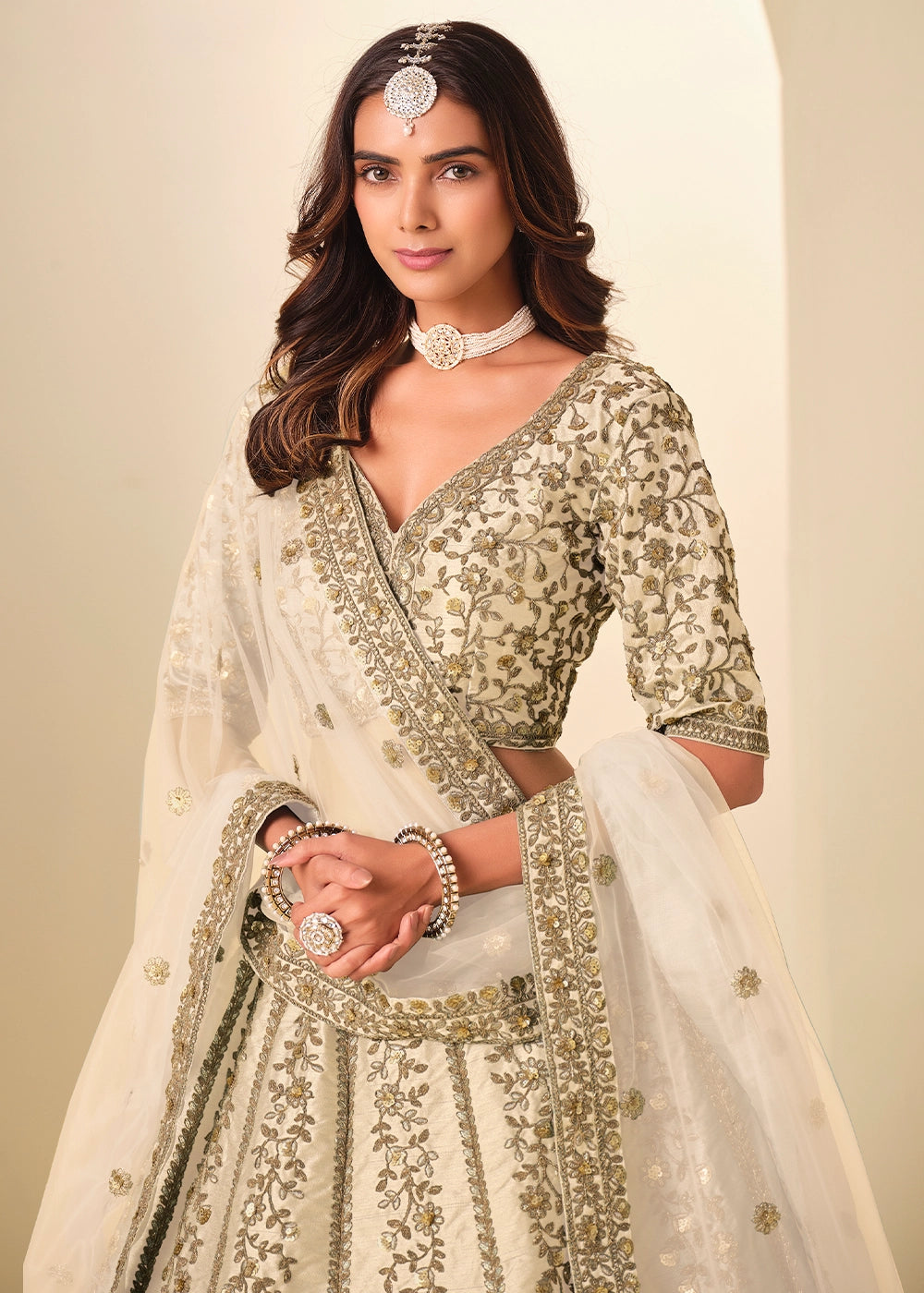 Cream White Wedding Wear Silk Lehenga Choli with Embellished Detailing