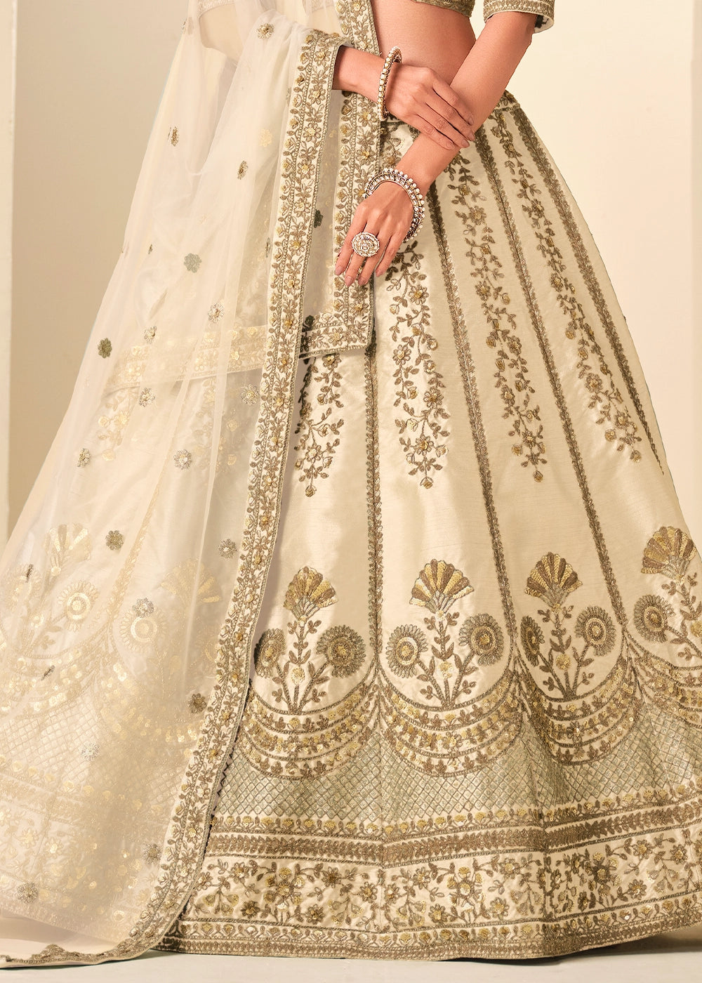 Cream White Wedding Wear Silk Lehenga Choli with Embellished Detailing