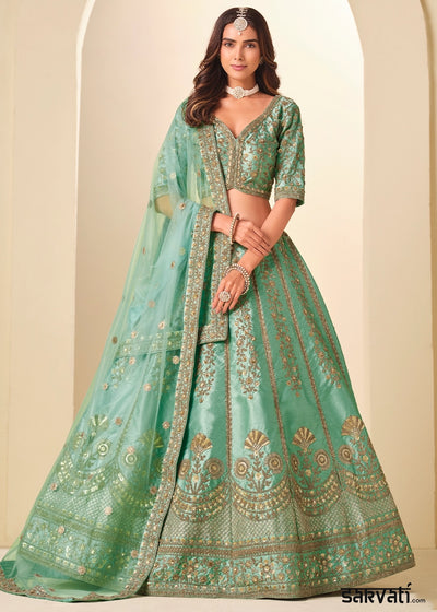 Sea Green Wedding Wear Silk Lehenga Choli with Embellished Detailing