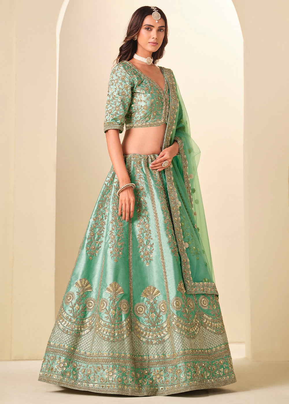 Sea Green Wedding Wear Silk Lehenga Choli with Embellished Detailing