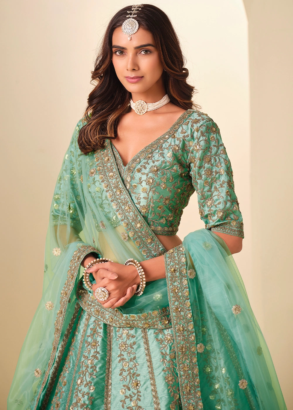 Sea Green Wedding Wear Silk Lehenga Choli with Embellished Detailing