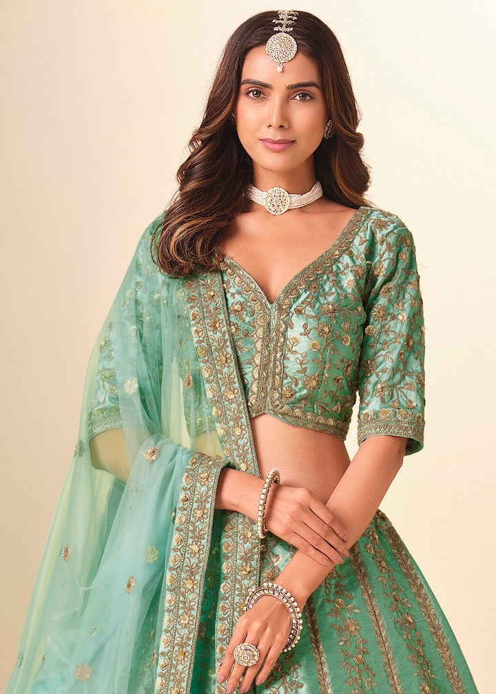 Sea Green Wedding Wear Silk Lehenga Choli with Embellished Detailing