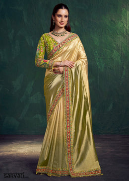 Golden & Green Tissue Silk Saree with Zari Weaving and Embroidered Blouse
