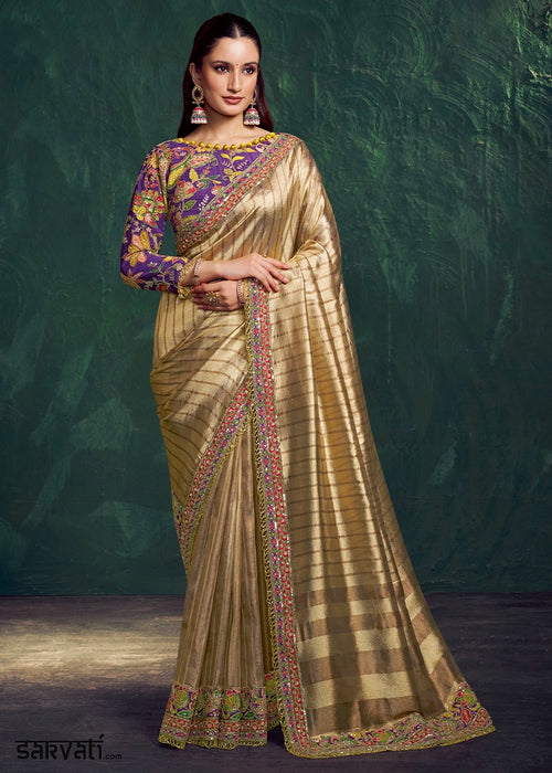 Shades of Golden Tissue Silk Saree with Zari Weaving and Embroidered Blouse