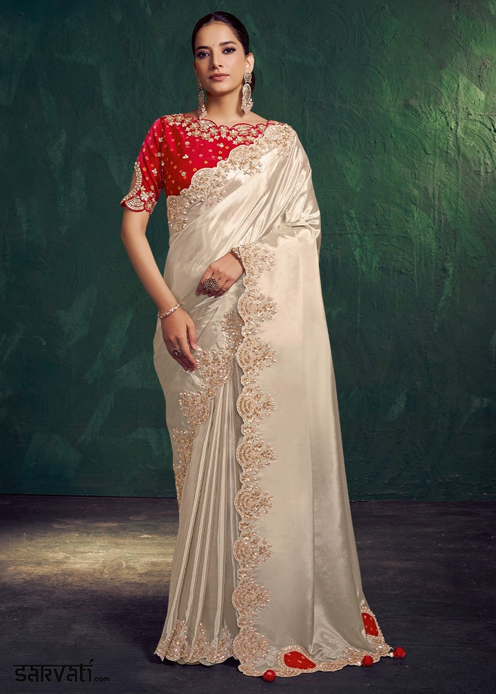 Cream White Uppada Silk Saree with Sequins and Stone Embellishment