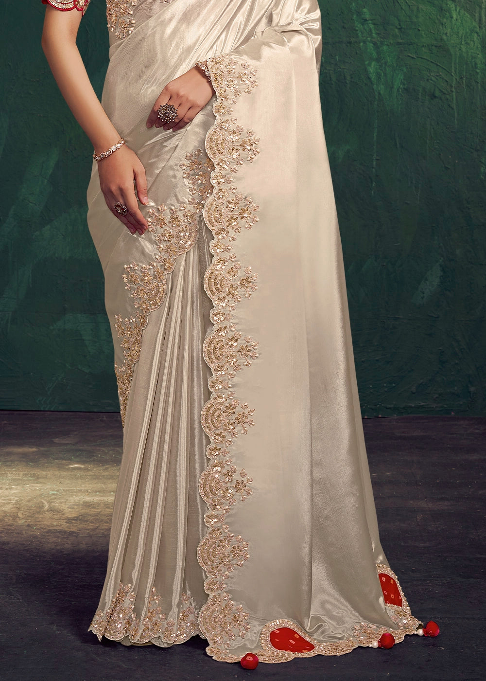 Cream White Uppada Silk Saree with Sequins and Stone Embellishment
