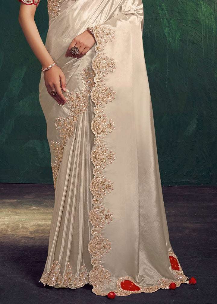 Cream White Uppada Silk Saree with Sequins and Stone Embellishment