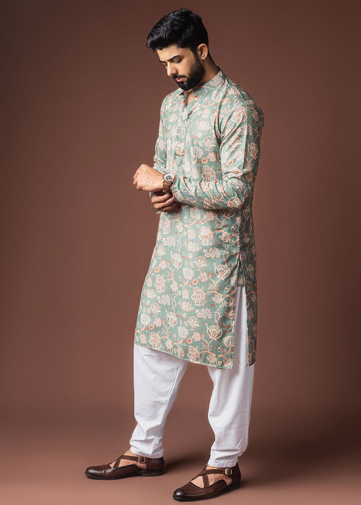 Cyan Opaque Blue Blended Linen Kurta with Floral Impressions