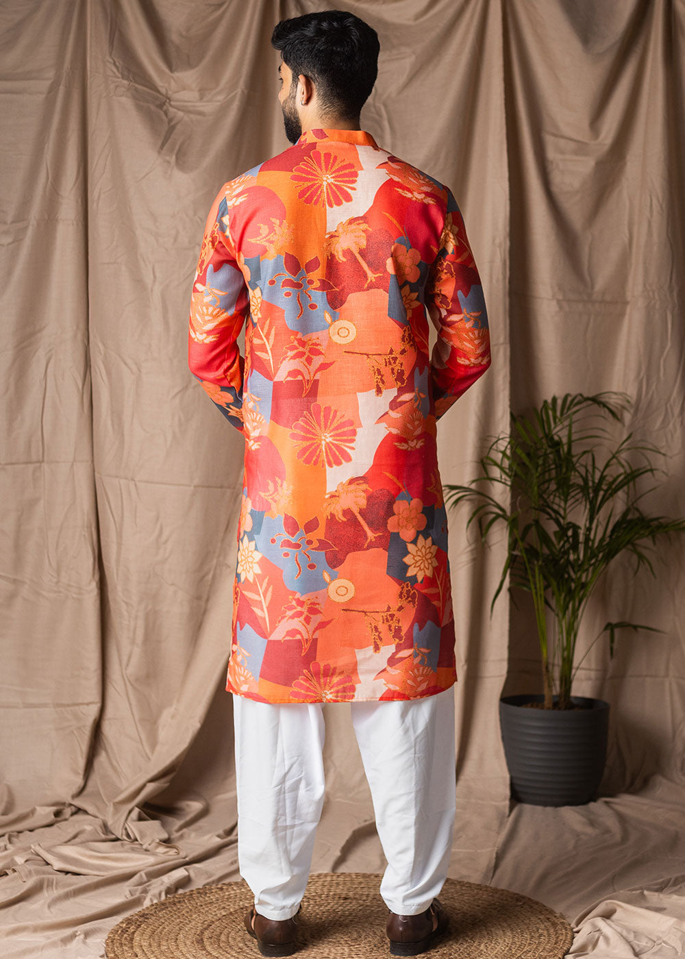 Bright Orange Blended Linen Kurta with Floral Silhouettes