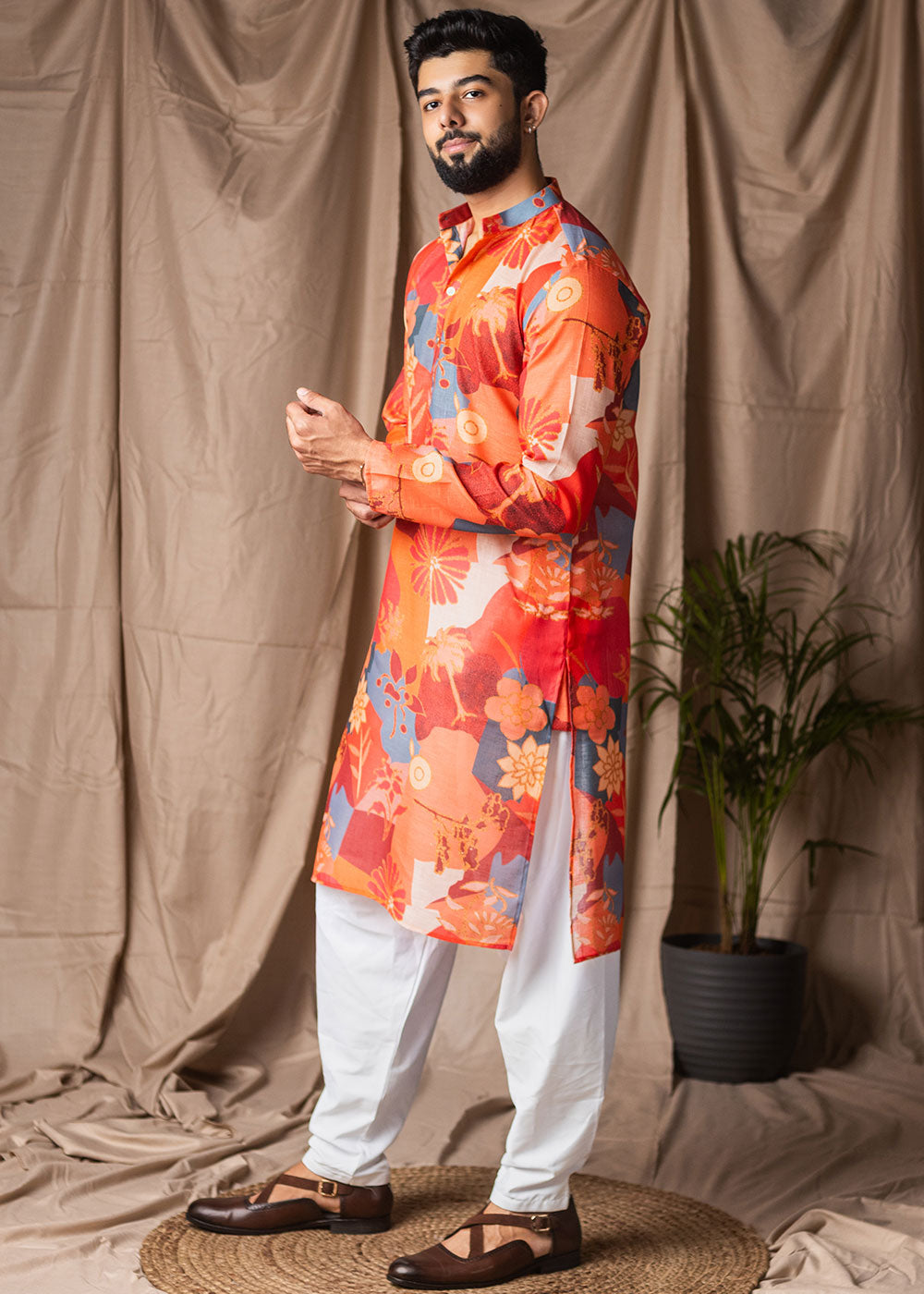 Bright Orange Blended Linen Kurta with Floral Silhouettes
