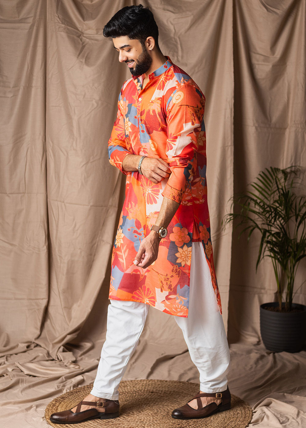 Bright Orange Blended Linen Kurta with Floral Silhouettes