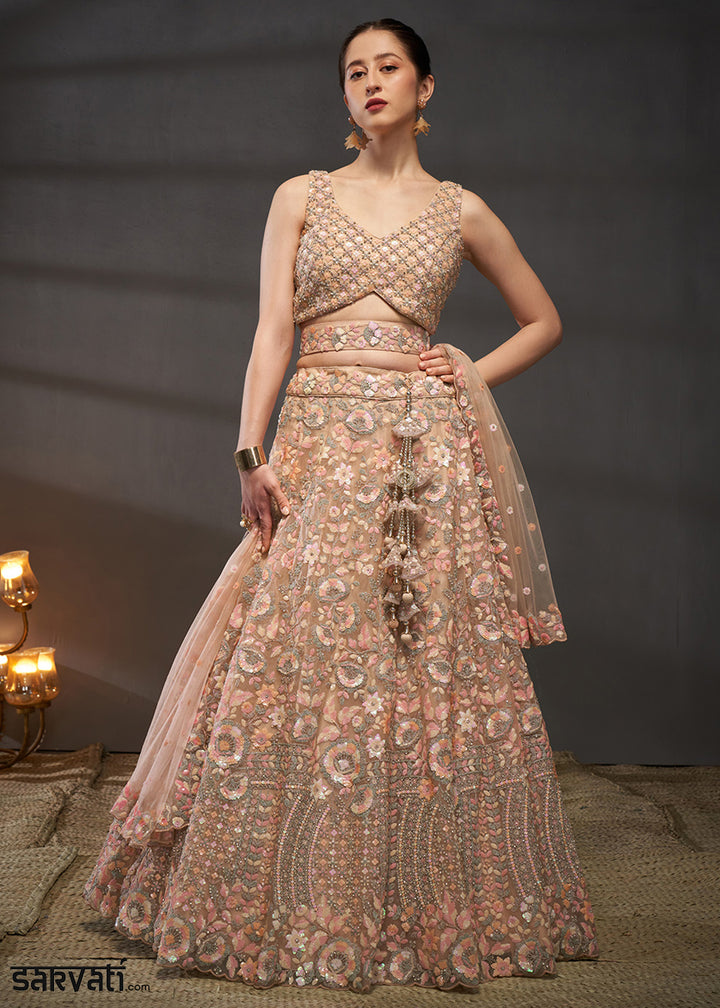 Creamy Peach Net Lehenga Choli with Heavy Sequin Threadwork, Floral Embroidery &amp; Embellished Belt