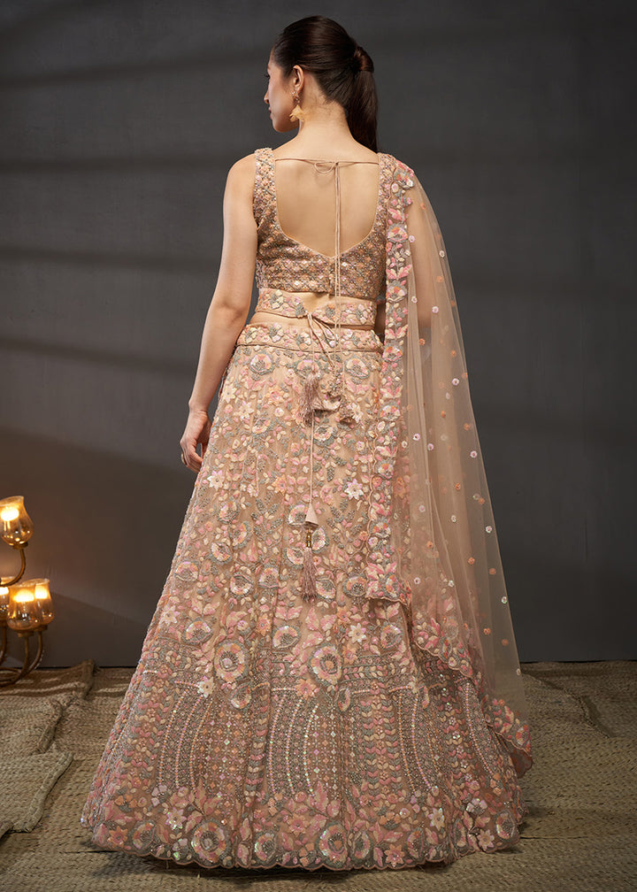 Creamy Peach Net Lehenga Choli with Heavy Sequin Threadwork, Floral Embroidery &amp; Embellished Belt