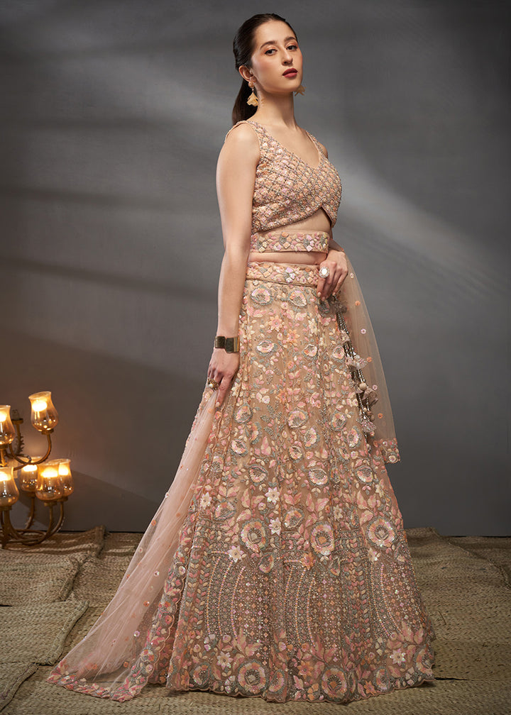 Creamy Peach Net Lehenga Choli with Heavy Sequin Threadwork, Floral Embroidery &amp; Embellished Belt