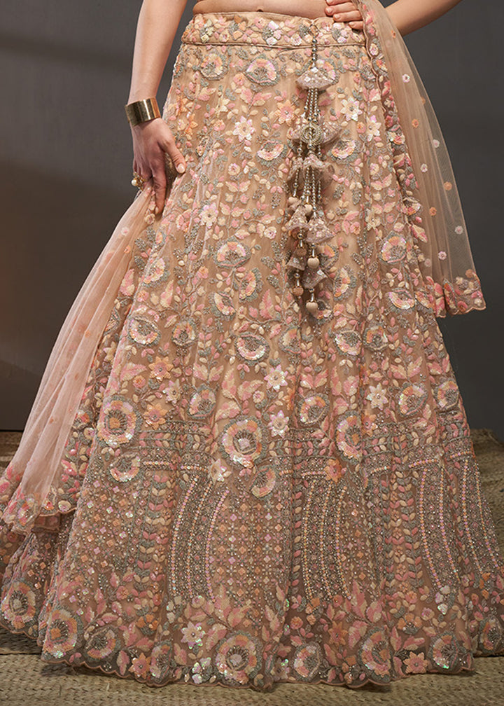 Creamy Peach Net Lehenga Choli with Heavy Sequin Threadwork, Floral Embroidery &amp; Embellished Belt