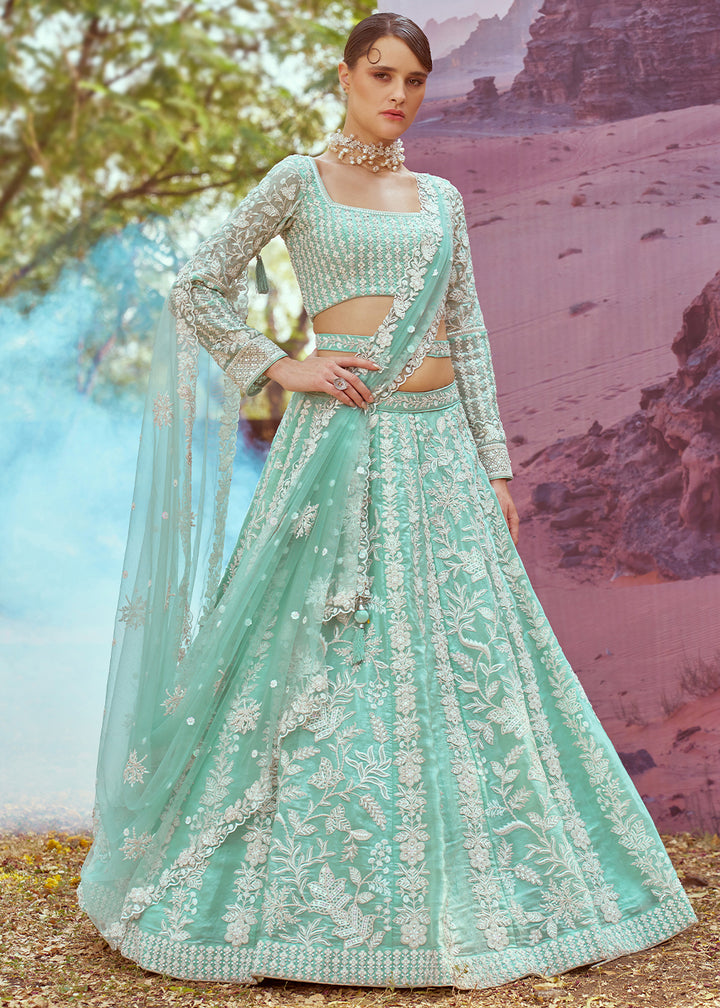 Sea Green Organza Lehenga Choli with Delicate Sequins Detailing