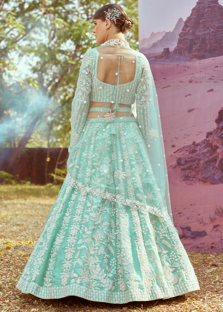 Sea Green Organza Lehenga Choli with Delicate Sequins Detailing