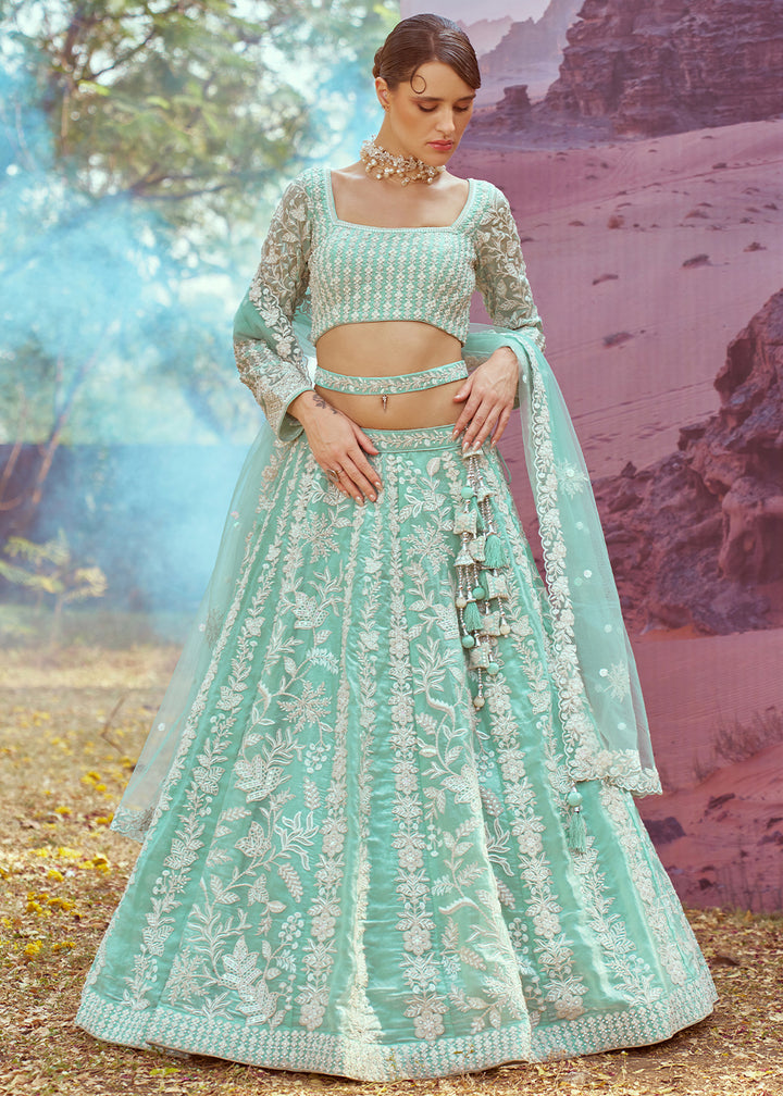 Sea Green Organza Lehenga Choli with Delicate Sequins Detailing