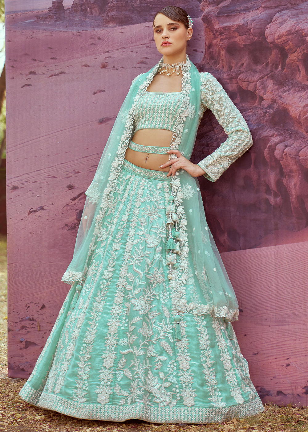 Sea Green Organza Lehenga Choli with Delicate Sequins Detailing