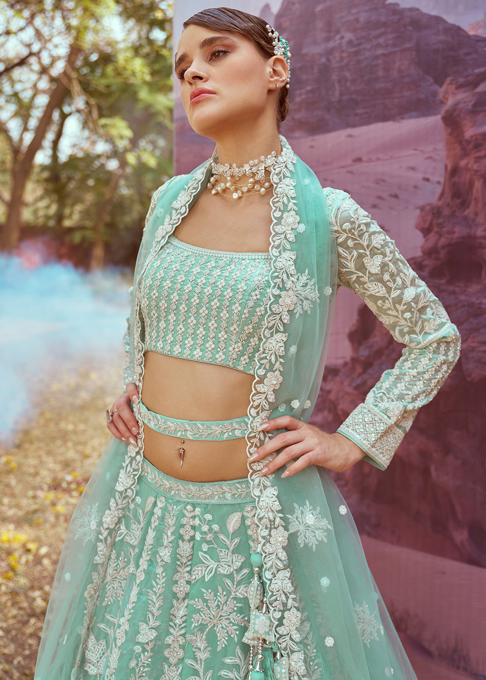 Sea Green Organza Lehenga Choli with Delicate Sequins Detailing