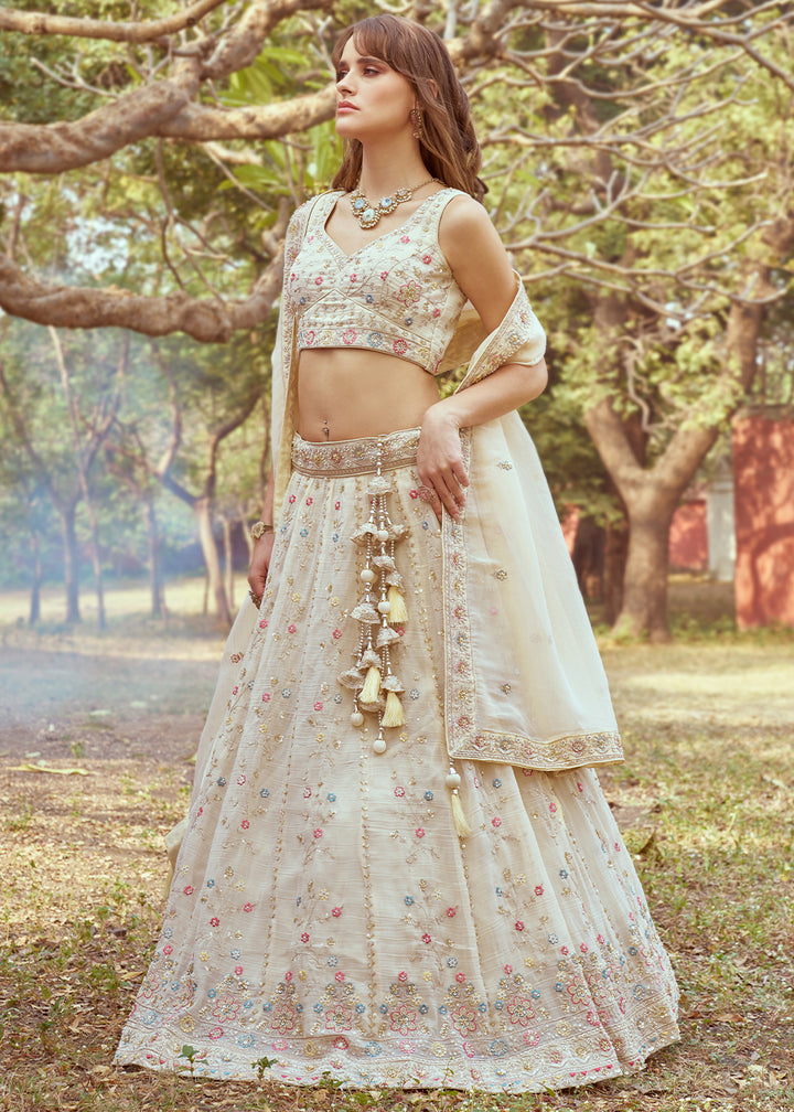 Cream White Lehenga Choli in Crushed Tissue with Charming Embroidery Work