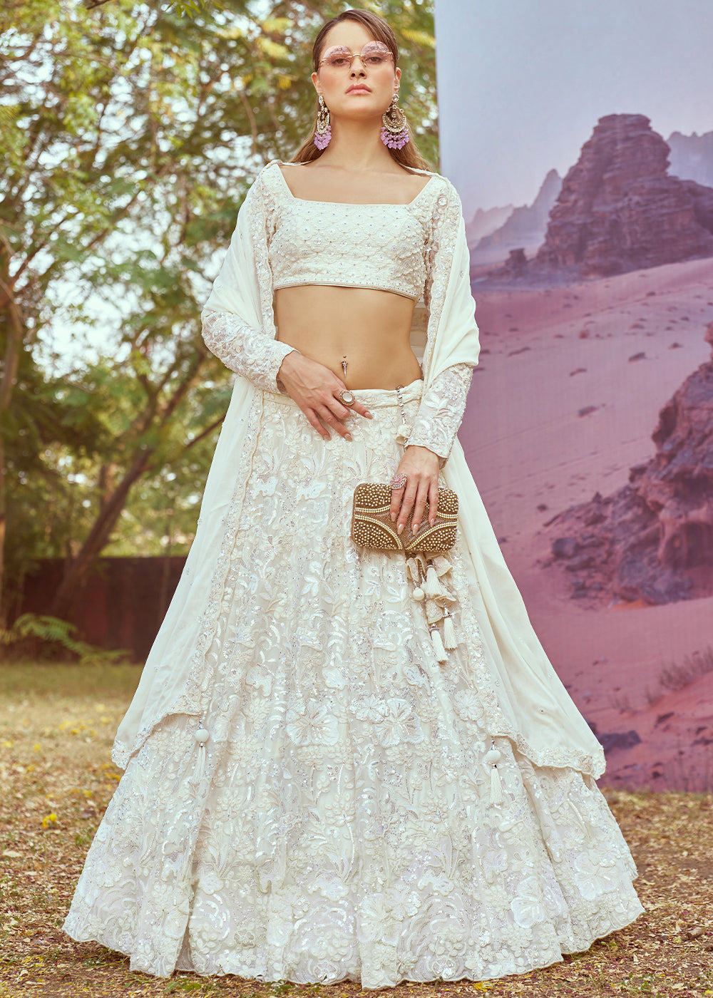 Cream White Georgette Lehenga Choli Adorned with Beads & Sparkling Stones