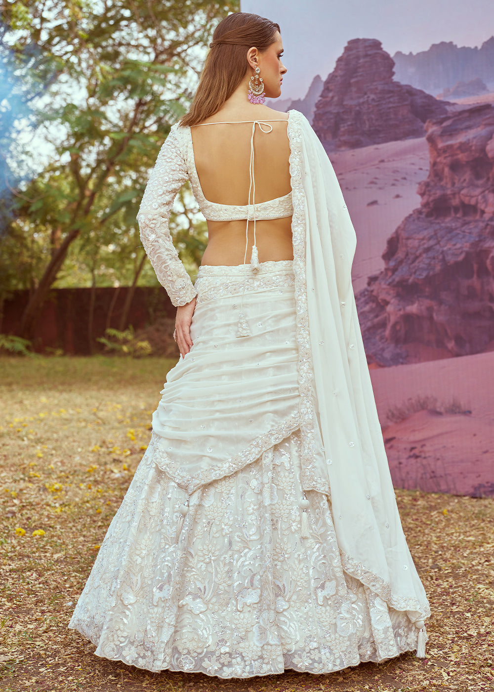 Cream White Georgette Lehenga Choli Adorned with Beads & Sparkling Stones