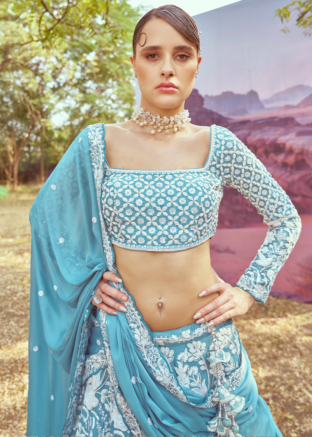 Pacific Blue Georgette Lehenga Choli Adorned with Beads & Sparkling Stones