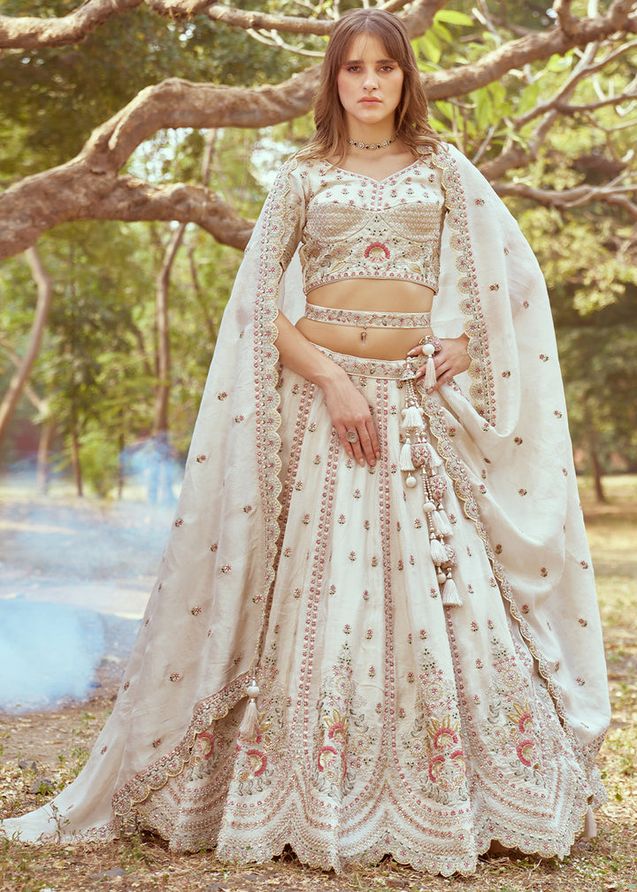 Parchment White Lehenga Choli in Crushed Tissue with Charming Embroidery Work