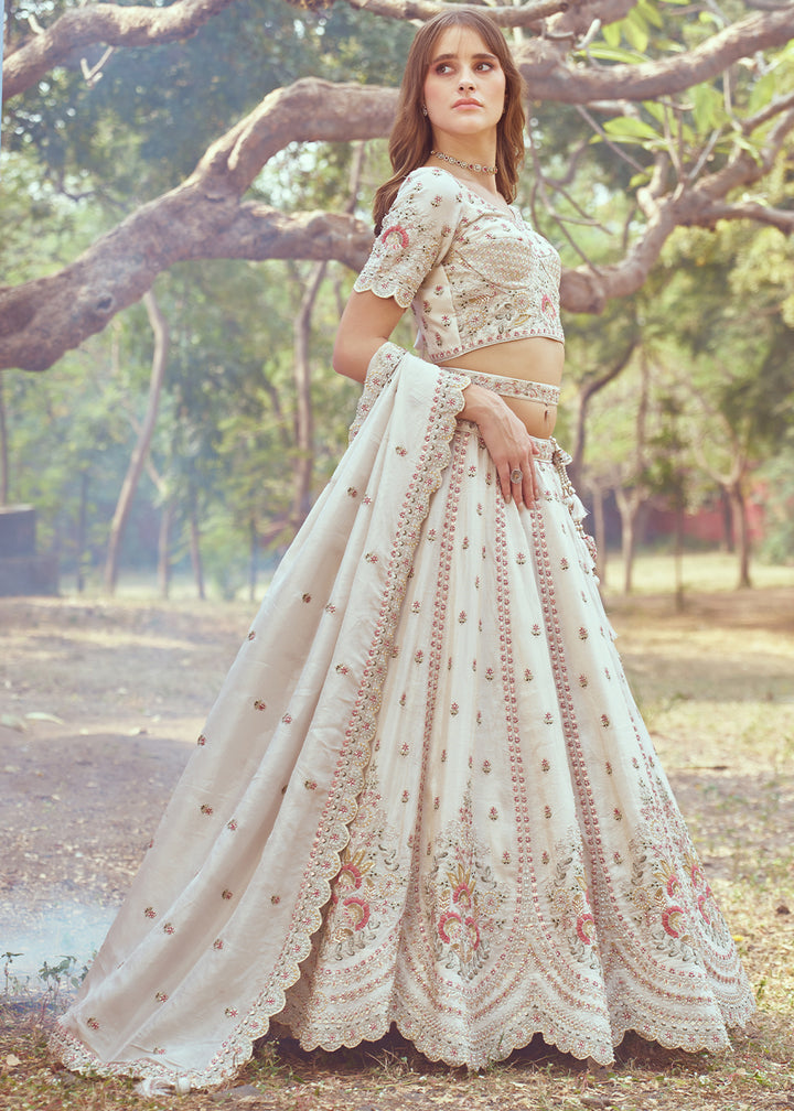 Parchment White Lehenga Choli in Crushed Tissue with Charming Embroidery Work