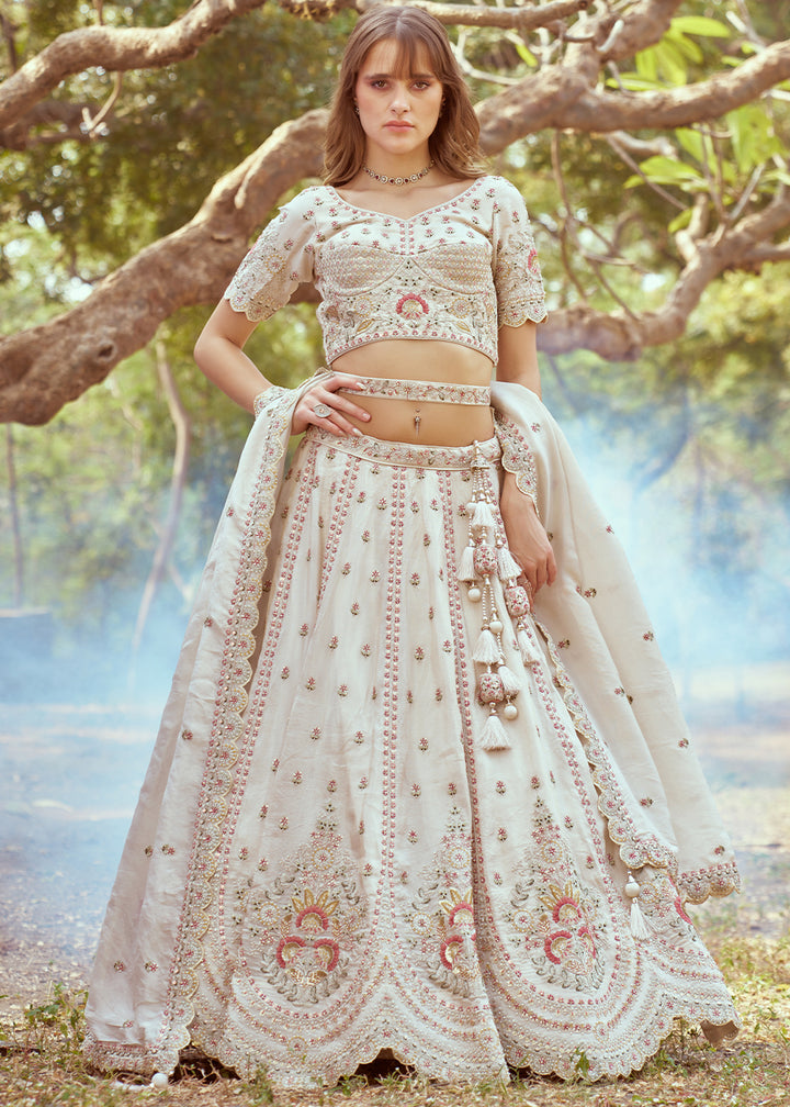 Parchment White Lehenga Choli in Crushed Tissue with Charming Embroidery Work