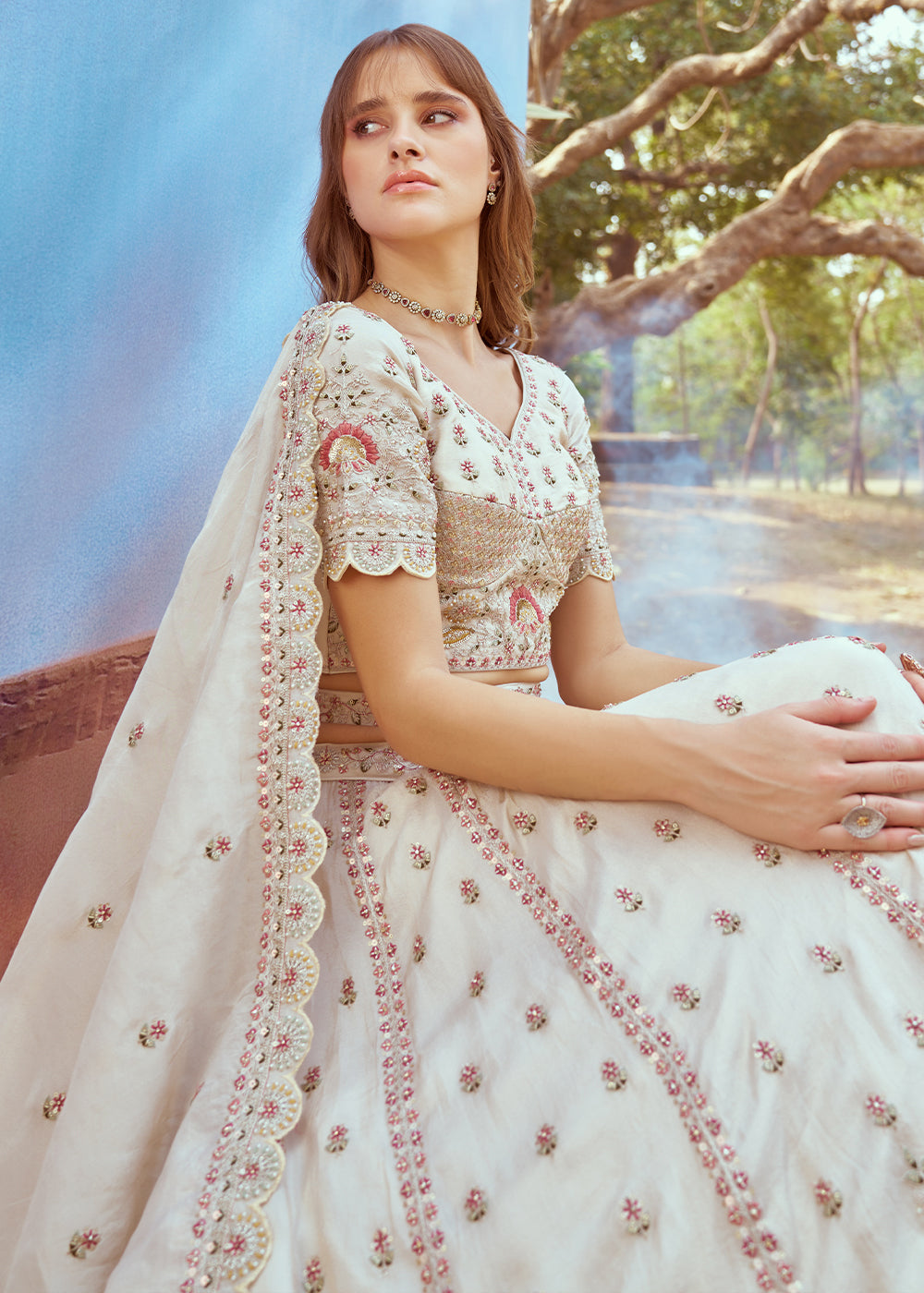 Parchment White Lehenga Choli in Crushed Tissue with Charming Embroidery Work