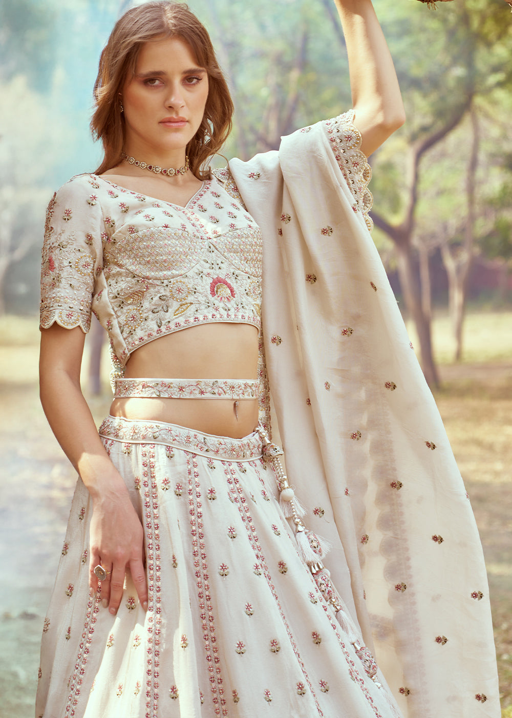 Parchment White Lehenga Choli in Crushed Tissue with Charming Embroidery Work