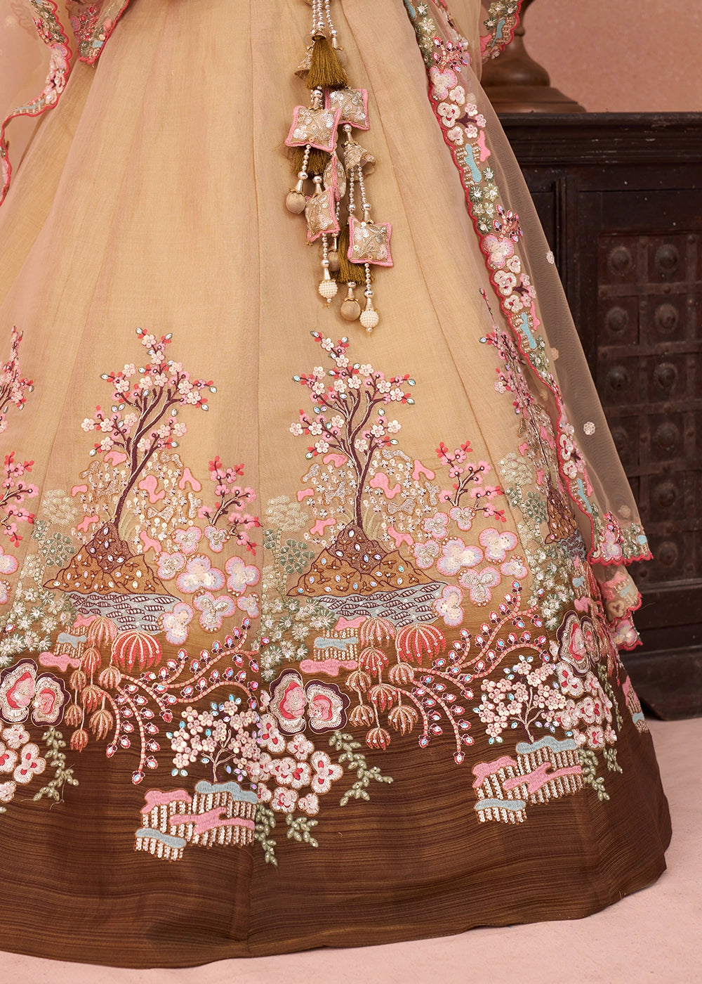 Shades Of Brown Net Lehenga Choli with Floral & Sequin Embroidery