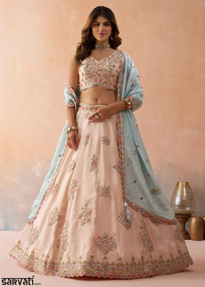 Light Peach Pink Tissue Lehenga Choli with Floral & Sequin Embroidery