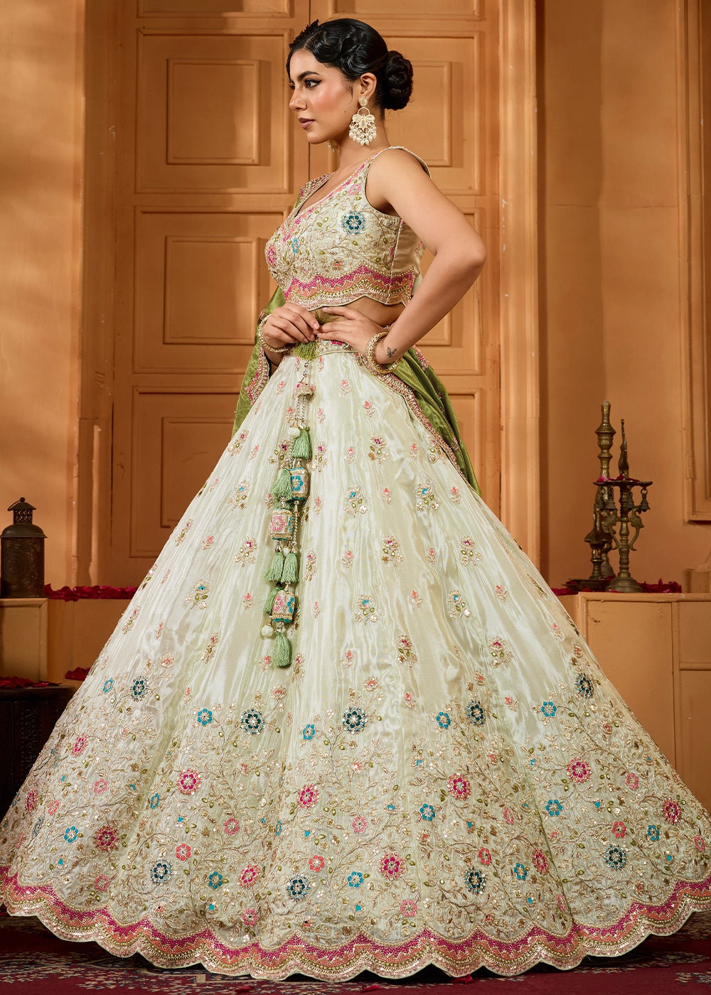 Tea Green Tissue Lehenga Choli with Handcrafted Floral & Sequin Work