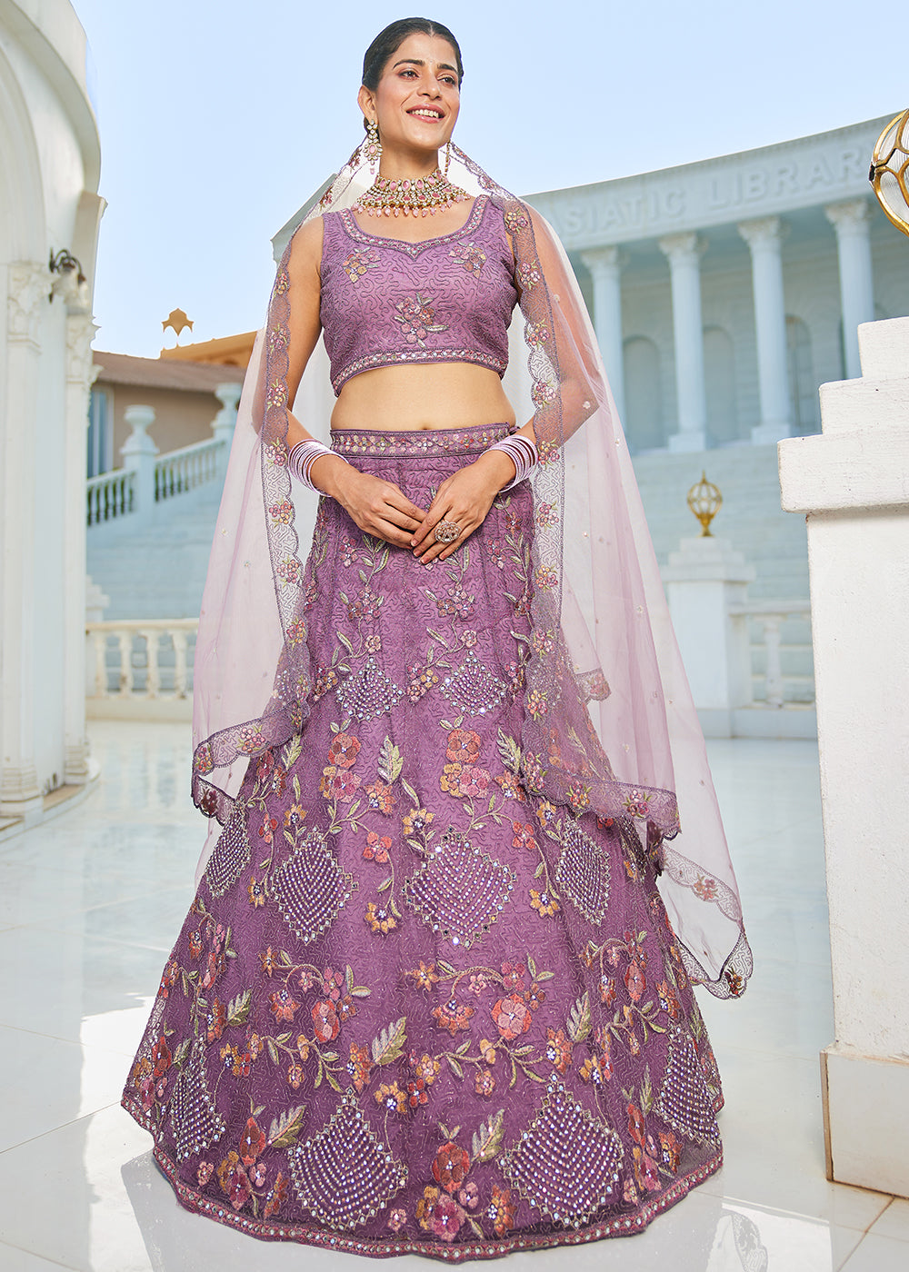 Tacao Purple Net Lehenga Choli with Coding & Zarkan Work