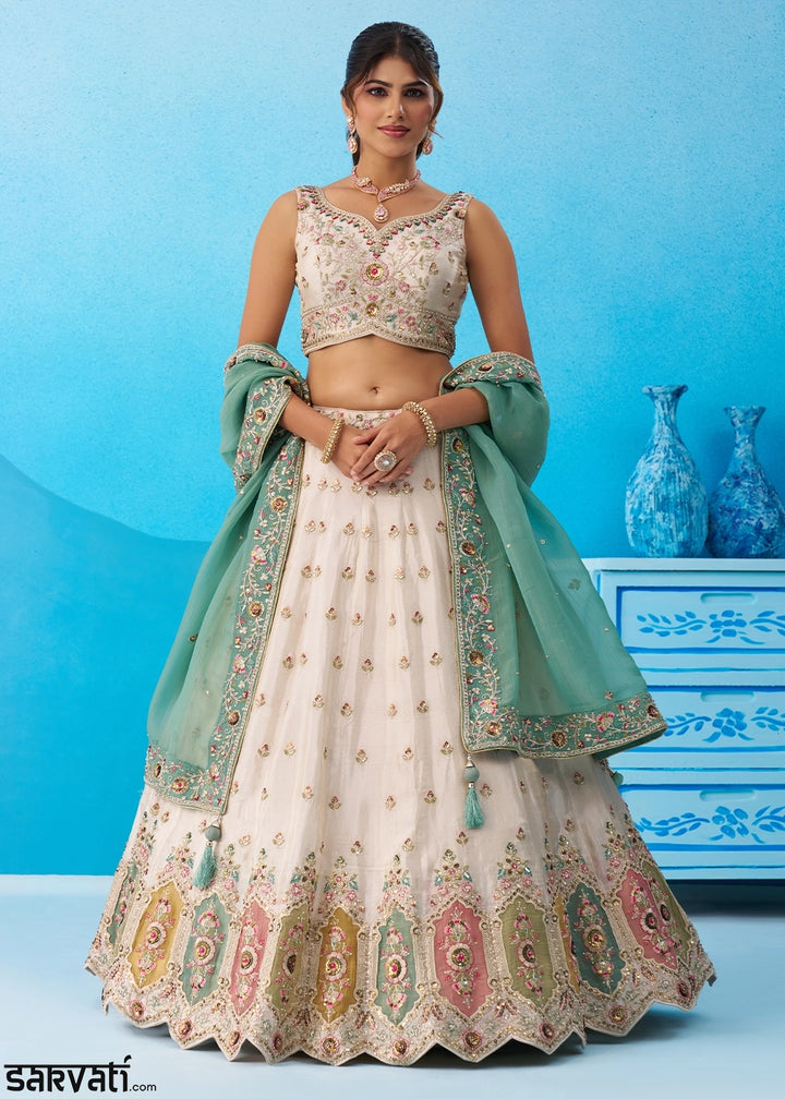 Cream White Tissue Lehenga Choli with Sequin Embroidery work with Blue Dupatta