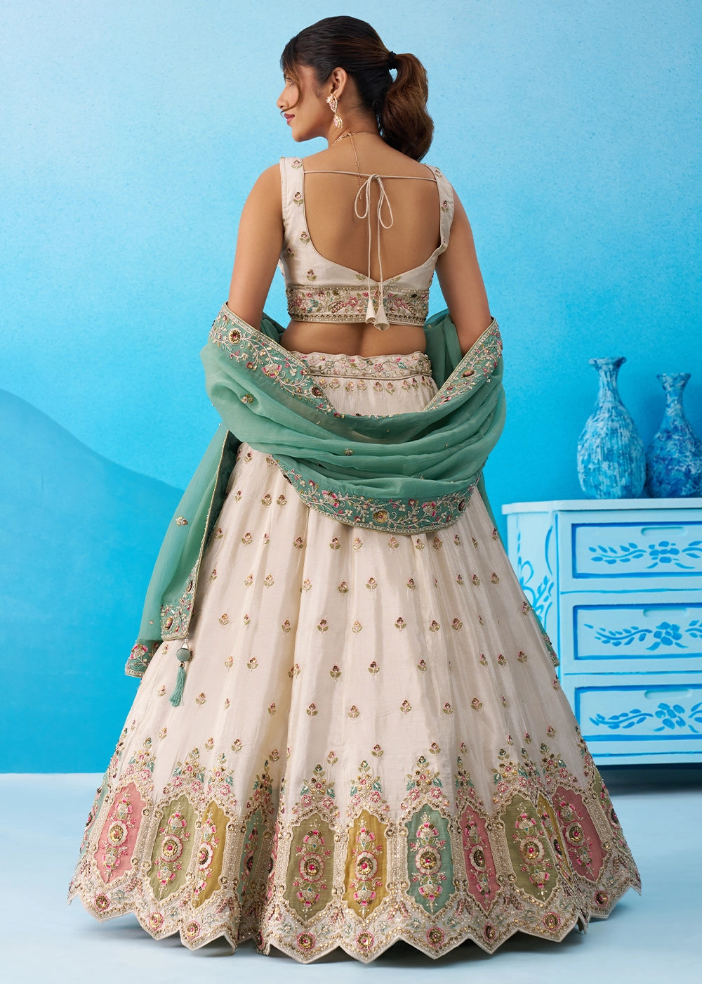Cream White Tissue Lehenga Choli with Sequin Embroidery work with Blue Dupatta