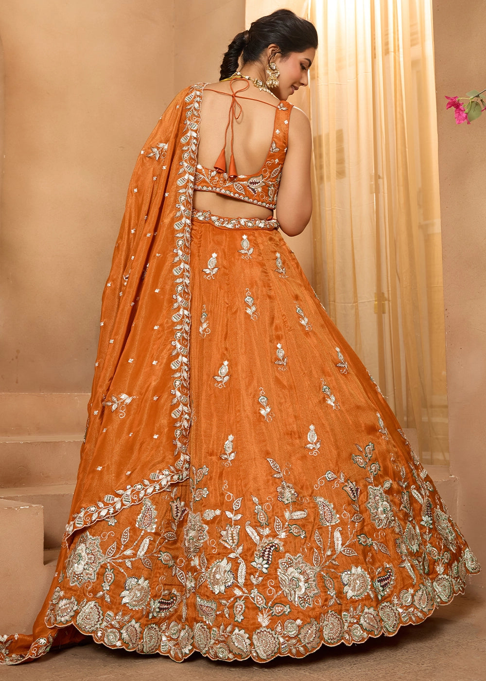 Pumpkin Orange Tissue Lehenga Choli with Handcrafted Floral & Sequin Work