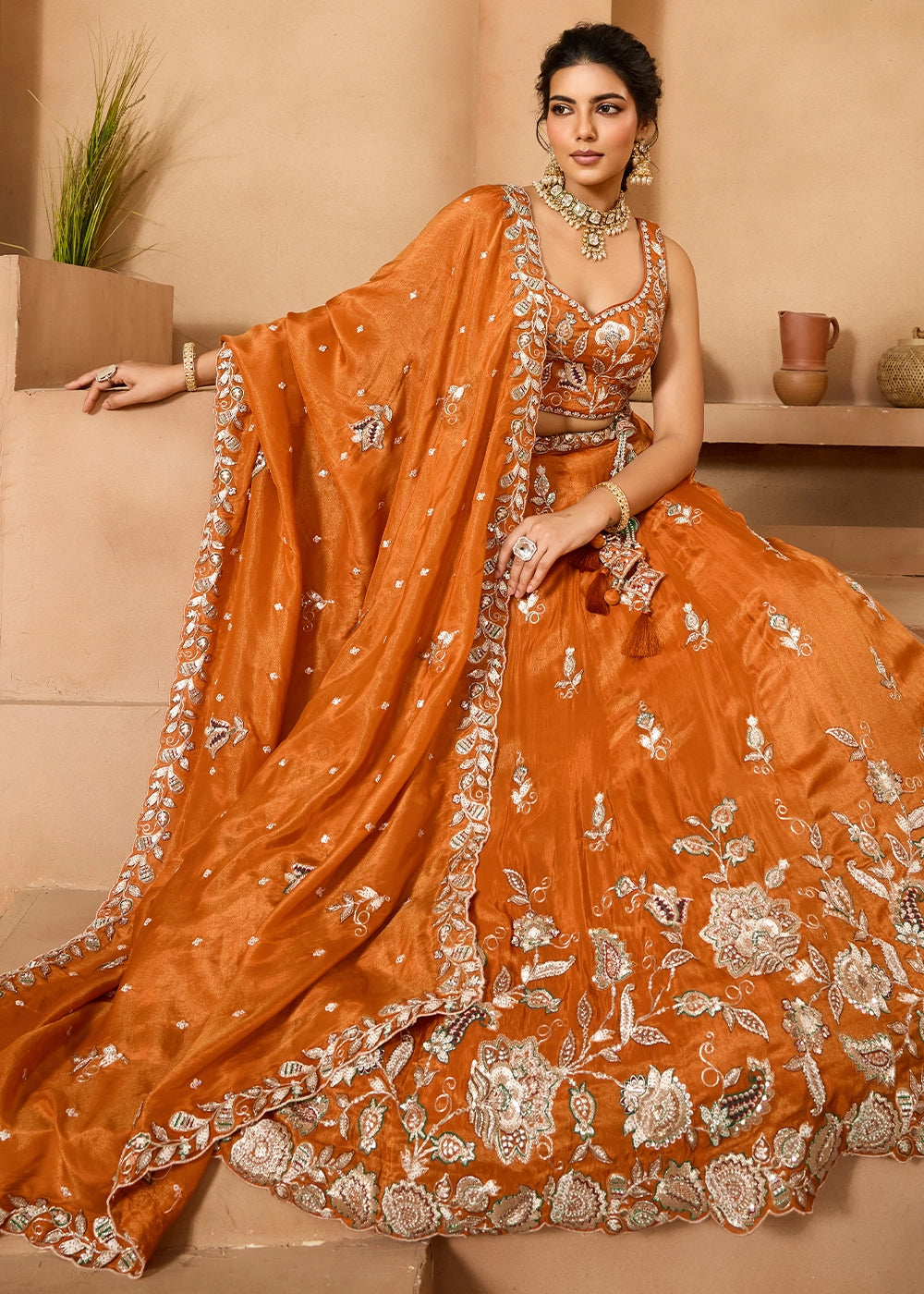 Pumpkin Orange Tissue Lehenga Choli with Handcrafted Floral & Sequin Work