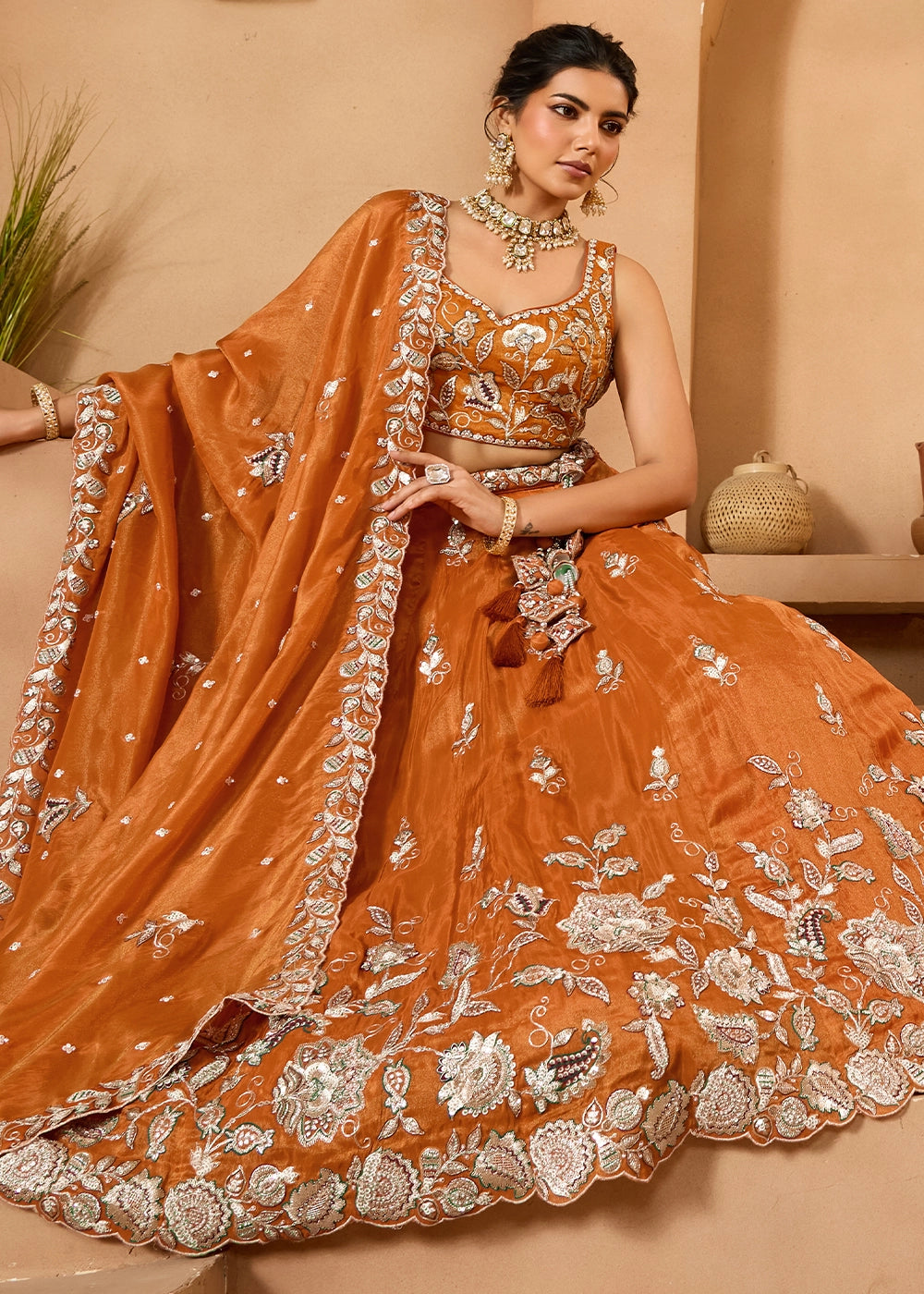 Pumpkin Orange Tissue Lehenga Choli with Handcrafted Floral & Sequin Work
