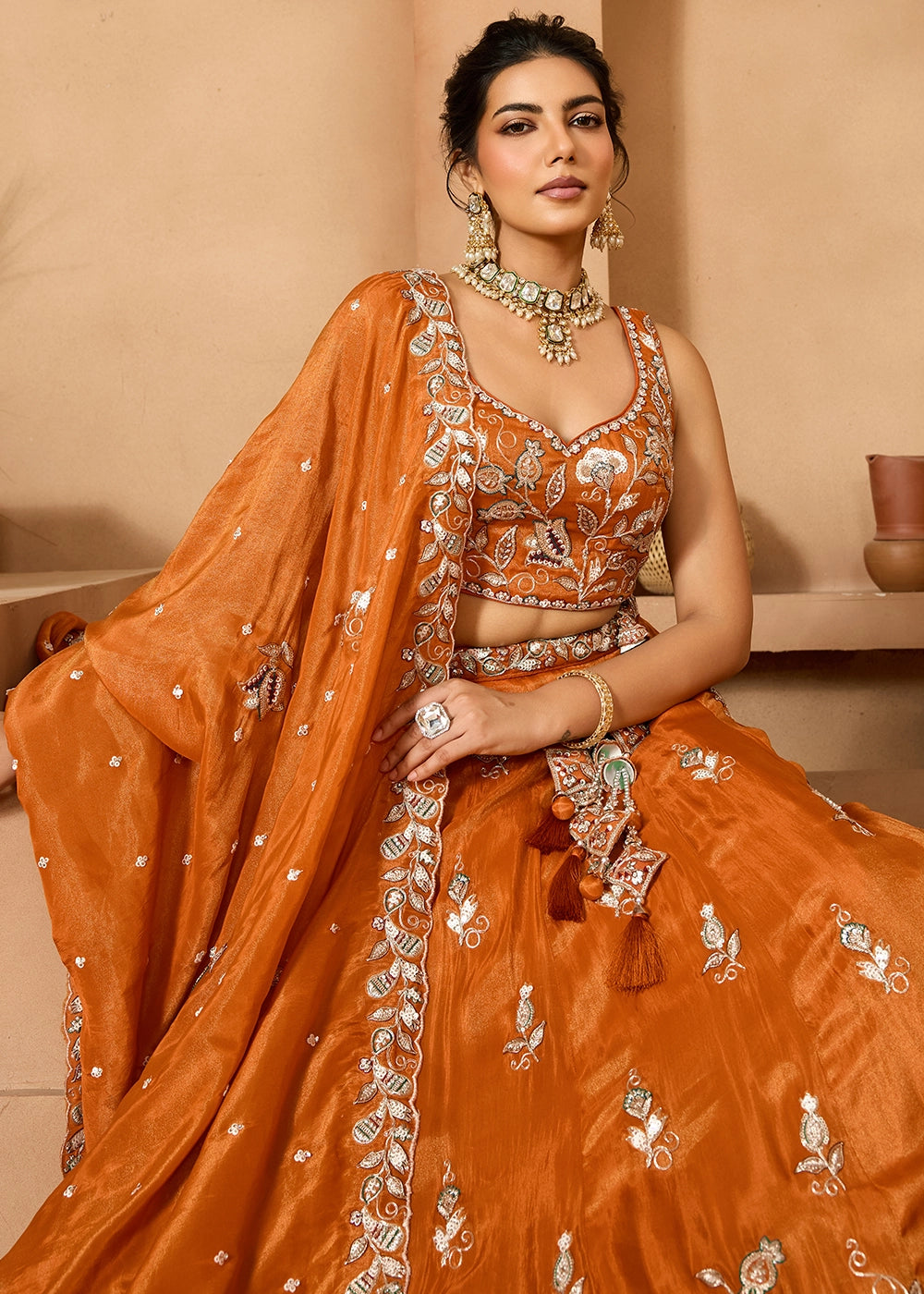 Pumpkin Orange Tissue Lehenga Choli with Handcrafted Floral & Sequin Work