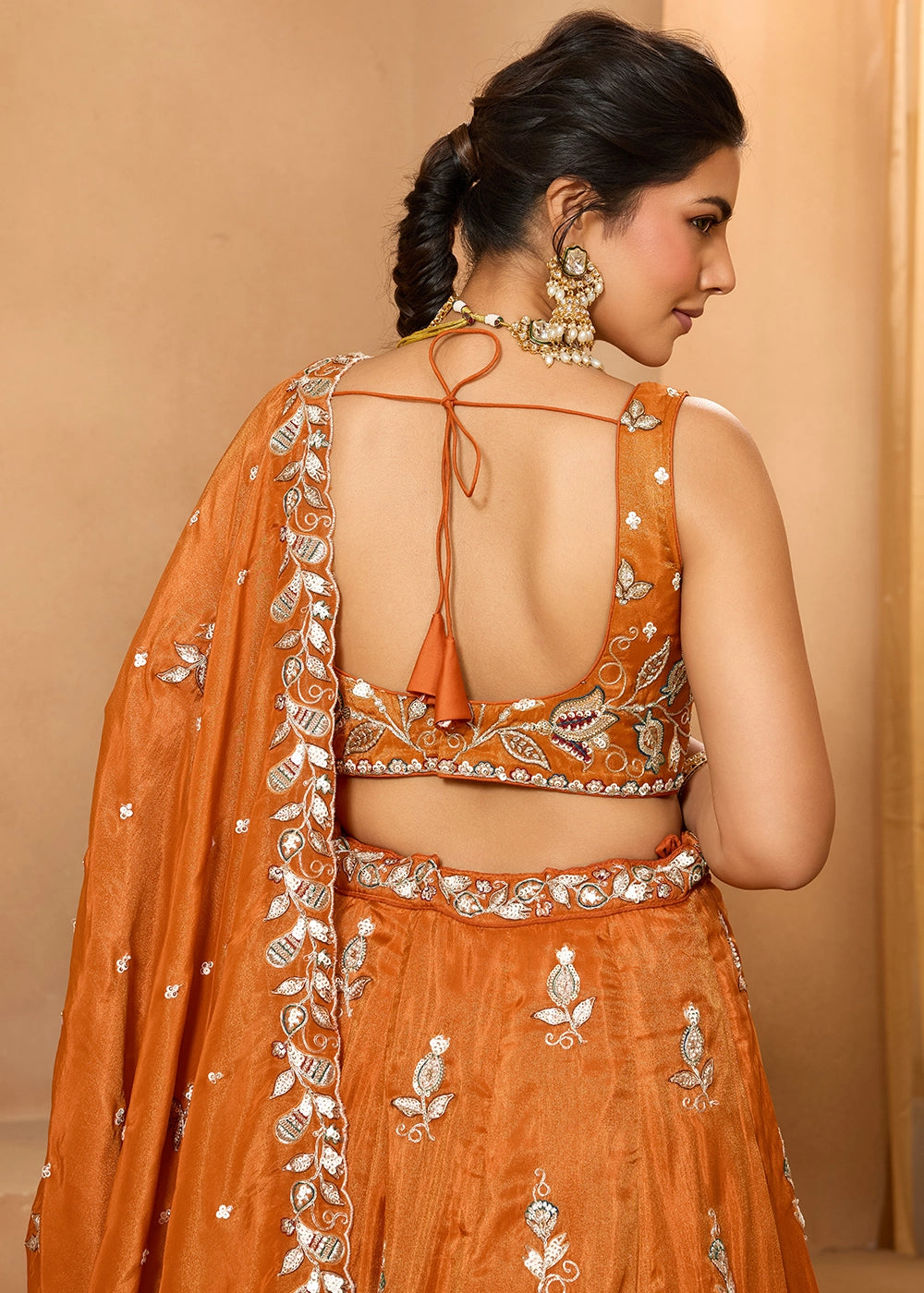 Pumpkin Orange Tissue Lehenga Choli with Handcrafted Floral & Sequin Work