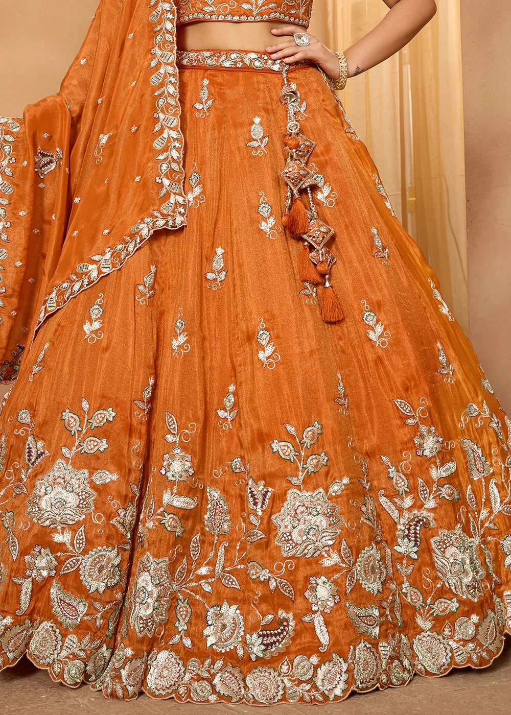 Pumpkin Orange Tissue Lehenga Choli with Handcrafted Floral & Sequin Work