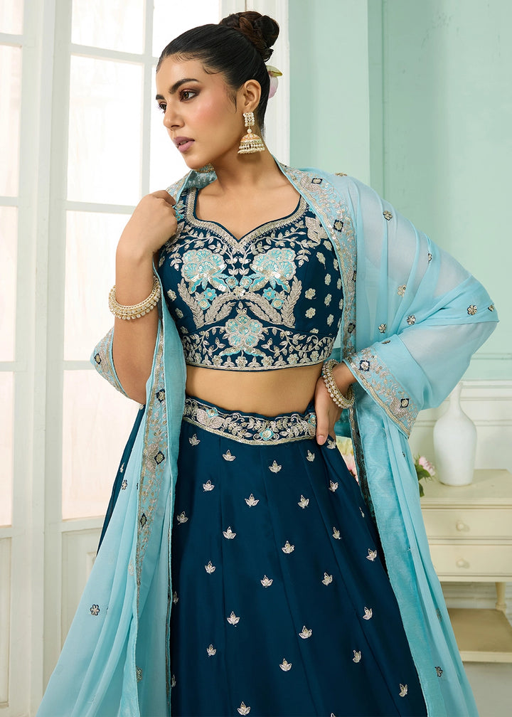 Prussian Blue Georgette Lehenga Choli with Handcrafted Floral & Sequin Work