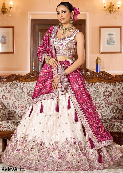 Ivory White Embroidered Tissue Lehenga Choli with Sequins Work