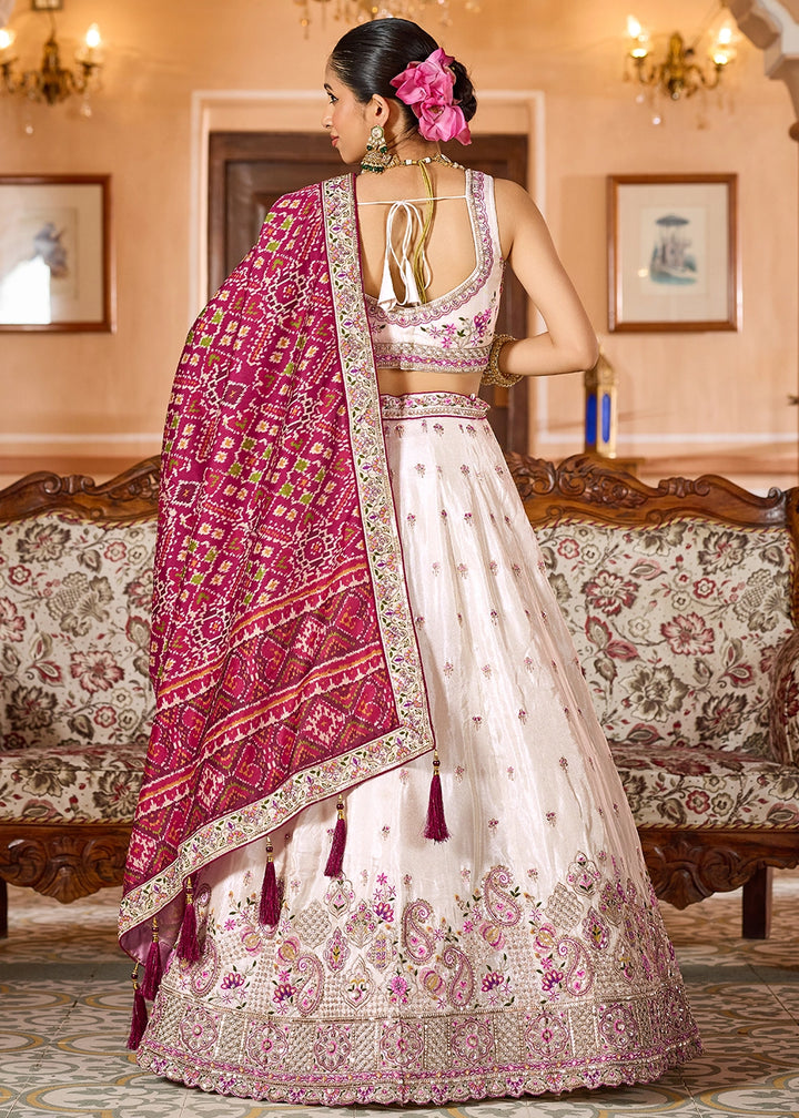 Ivory White Embroidered Tissue Lehenga Choli with Sequins Work