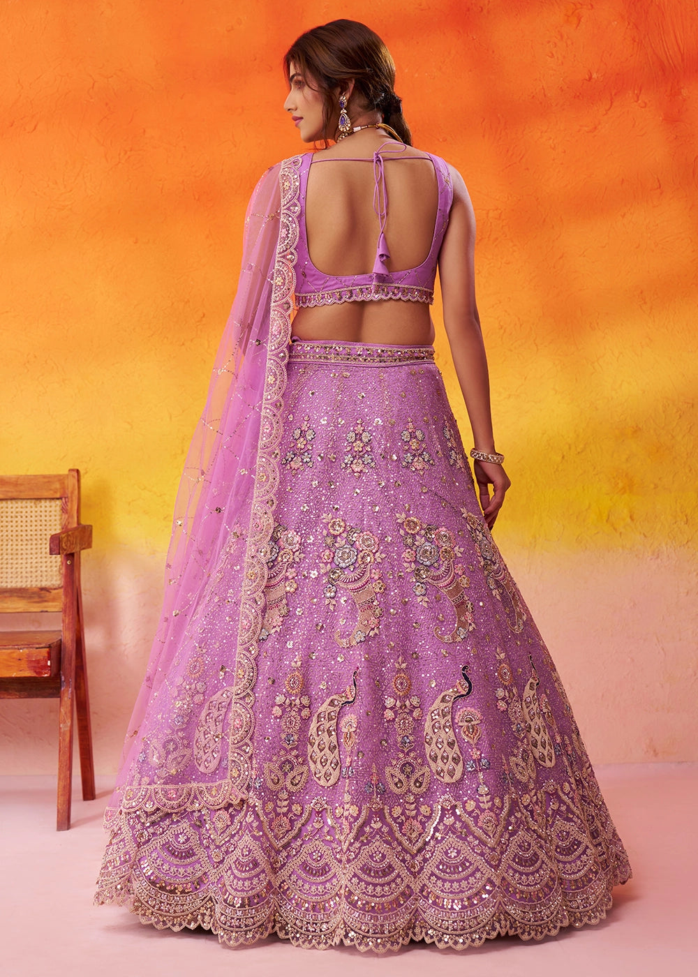 Orchid Purple Net Embellished Lehenga Choli with Sequins Embroidery