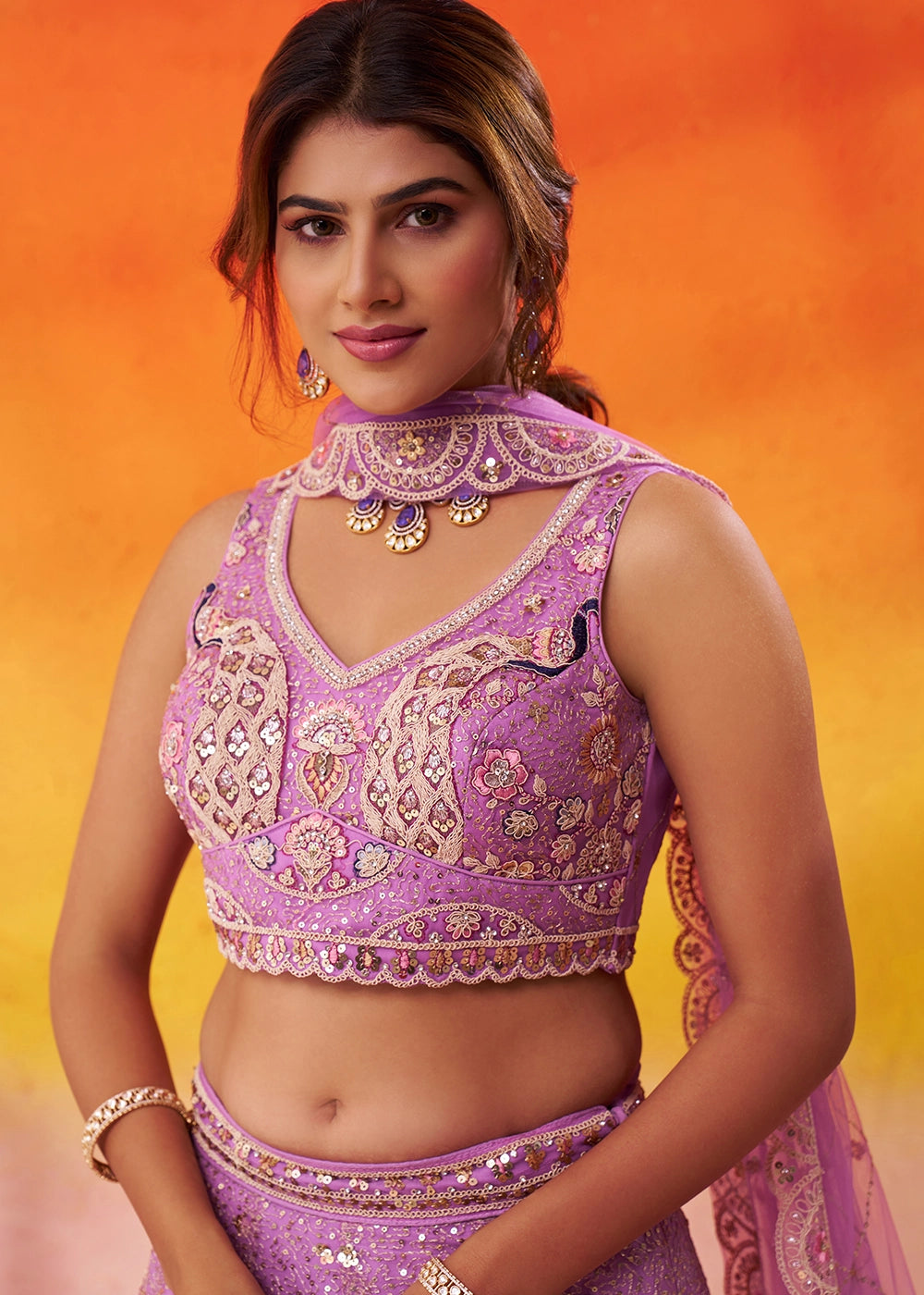 Orchid Purple Net Embellished Lehenga Choli with Sequins Embroidery